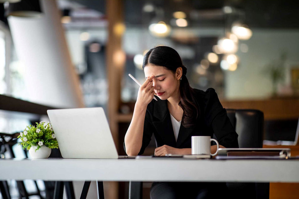 The Top 10 Low-Stress Jobs for People with Social Anxiety Employee appearing anxious before a workplace meeting