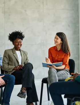 psychotherapy meeting support woman therapy psychology business office entrepreneur teamwork creative startup friendship group  leader coach psychologis communication help circle advice Group psychotherapy. Persons sitting in circle and talking. People meeting. Psychotherapy training, business lecture or conference. Man woman support group. Young businesspeople having a meeting in the office, young businesswoman entrepreneur