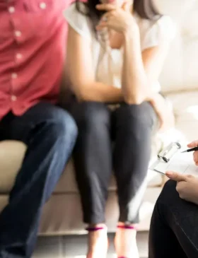 Family therapy session addressing addiction and mental health together