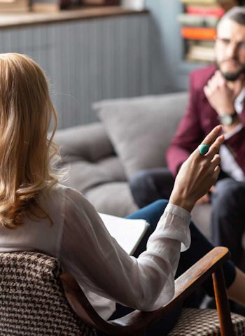 Professional attending outpatient addiction treatment program