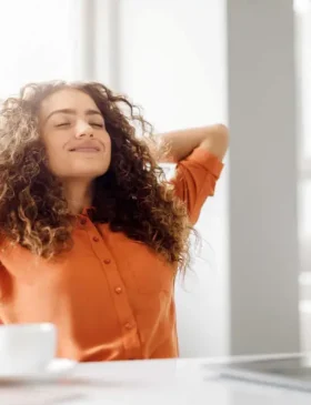 Freelance creative professional working independently on a laptop